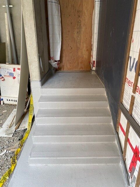 A strata walkway resurfaced with polyurea traffic coating by West Coast Waterproofing