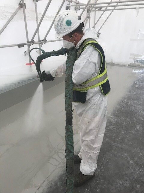 Spray-applied polyurea membrane being installed by West Coast Waterproofing