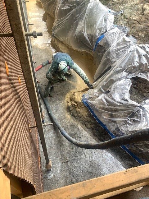 Spray-applied polyurea membrane being installed by West Coast Waterproofing