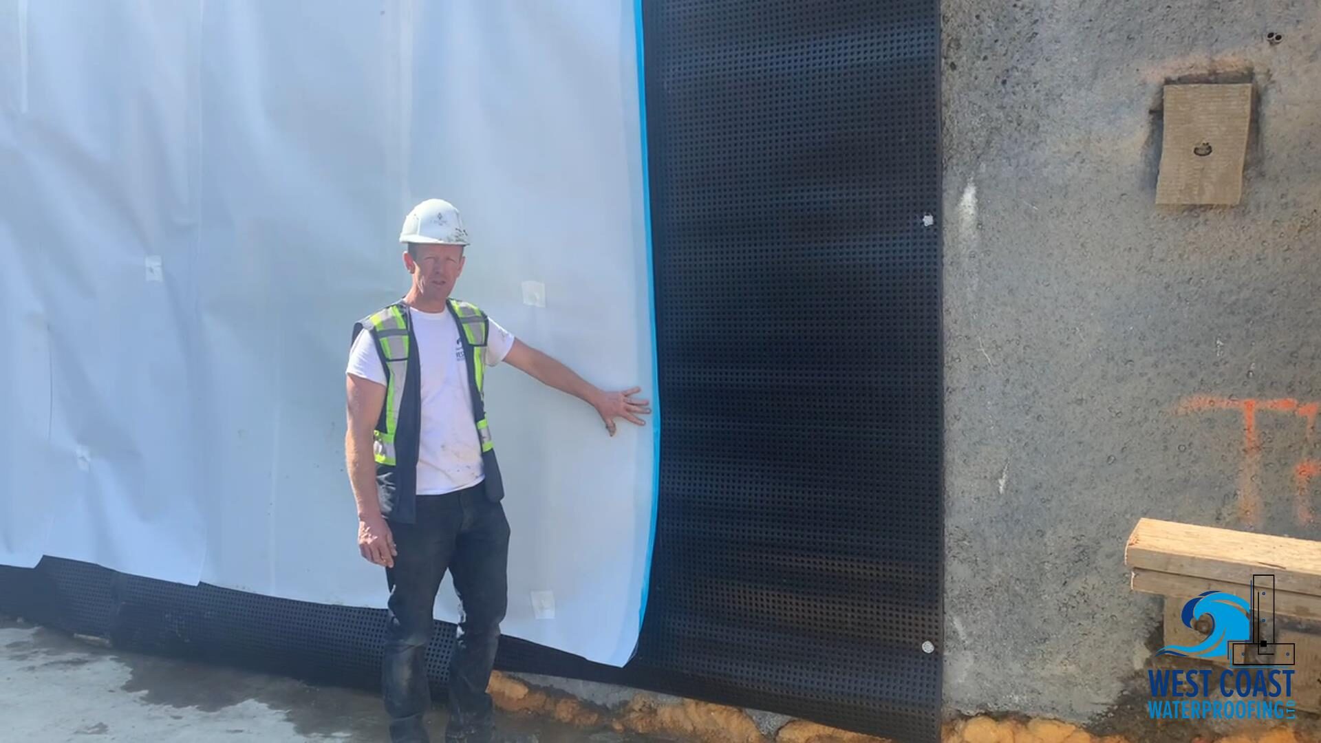 Blindside pre-applied waterproofing membrane installed against shoring by West Coast Waterproofing