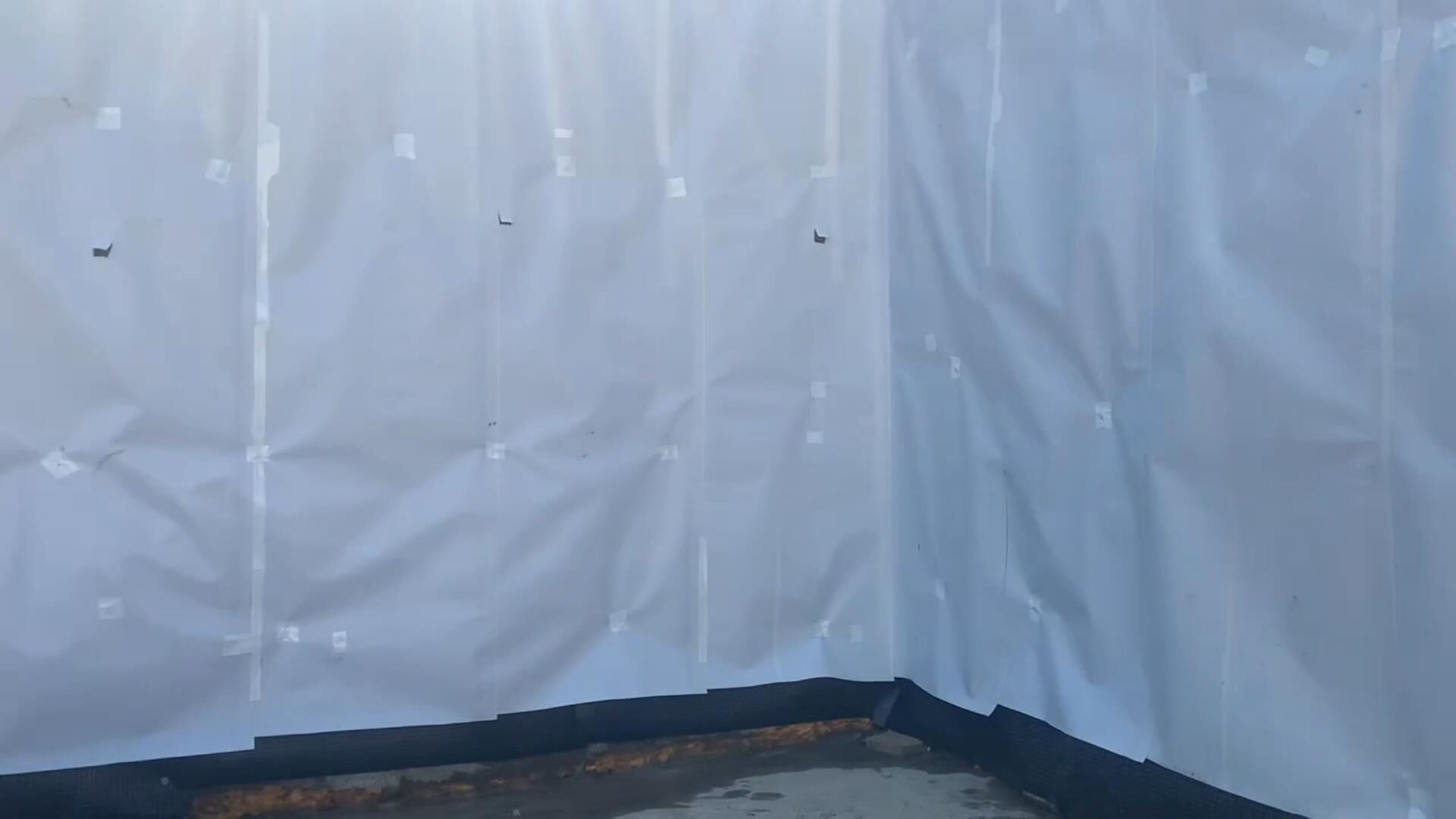 Blindside pre-applied waterproofing membrane installed against shoring by West Coast Waterproofing