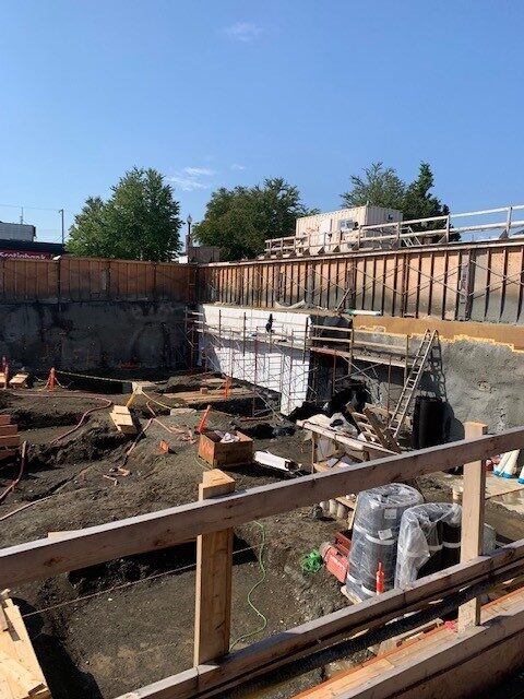 Blindside pre-applied waterproofing membrane installed against shoring by West Coast Waterproofing