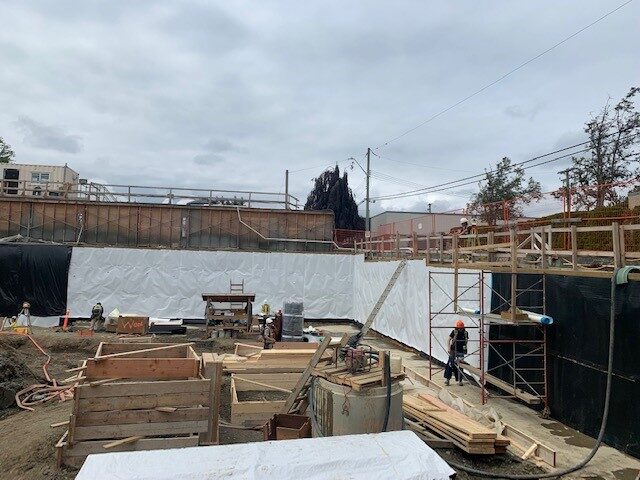 Blindside pre-applied waterproofing membrane installed against shoring by West Coast Waterproofing