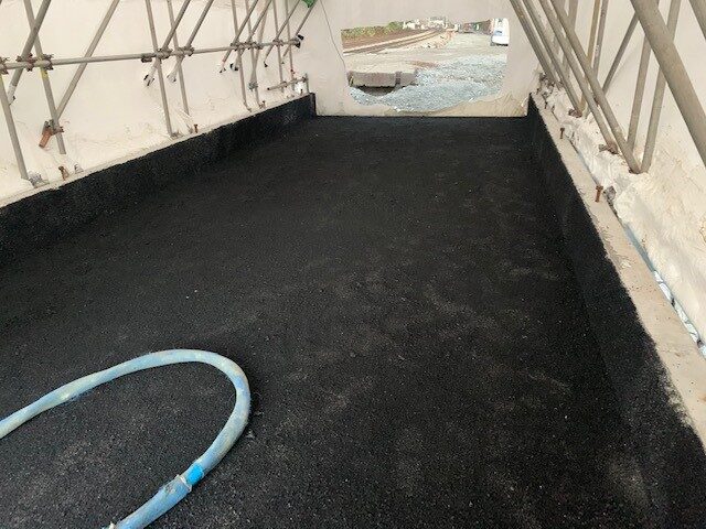 CN rail bridge deck being resurfaced and waterproofed by West Coast Waterproofing